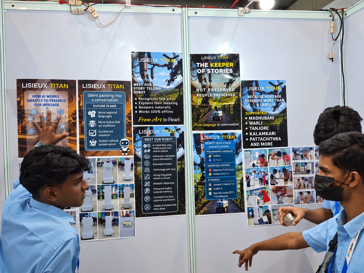 Lisieux Titan students at their booth, pointing to posters about Keeper of Stories, its tech stack and the art traditions it supports.